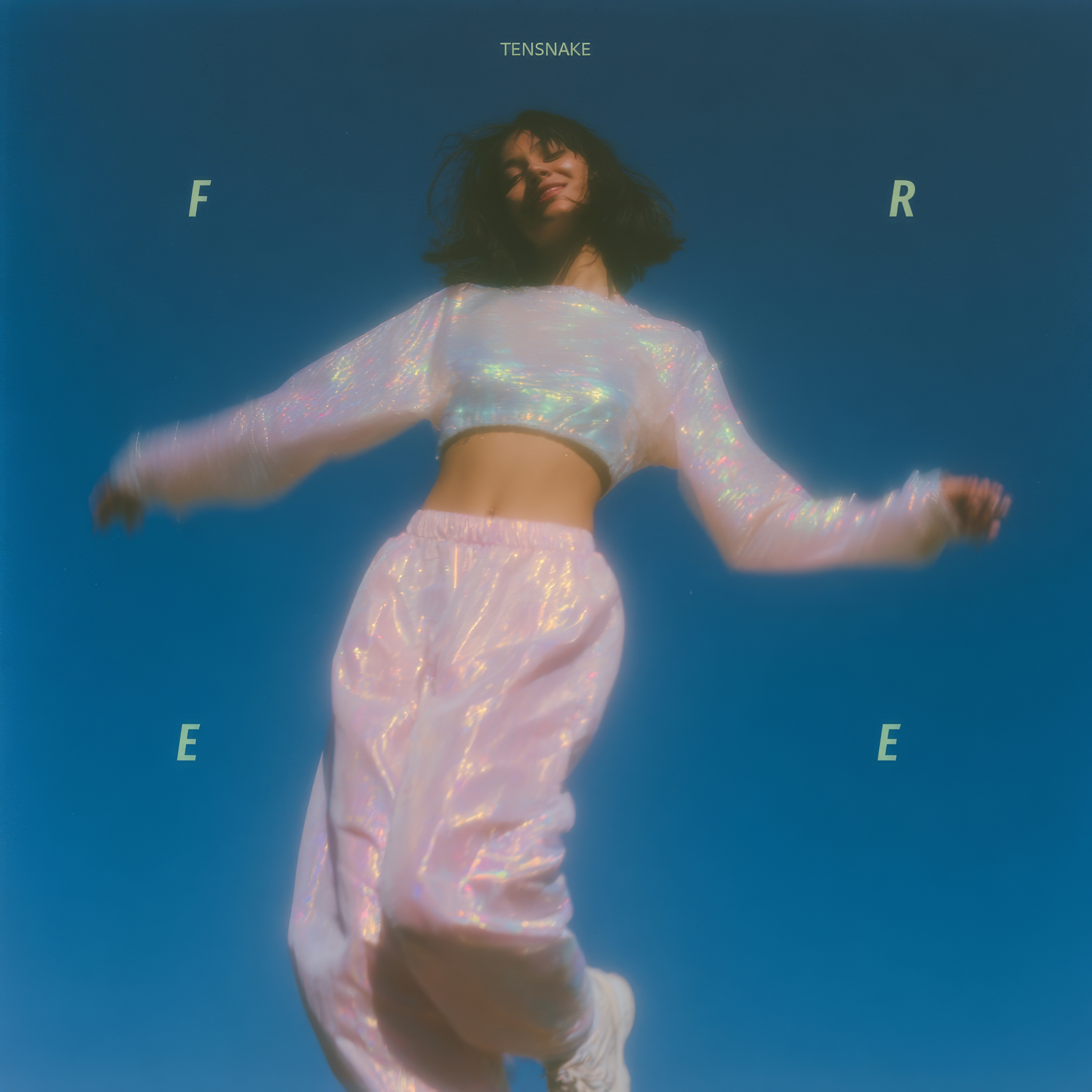 Tensnake FREE cover artwork — a dancer in a silver outfit